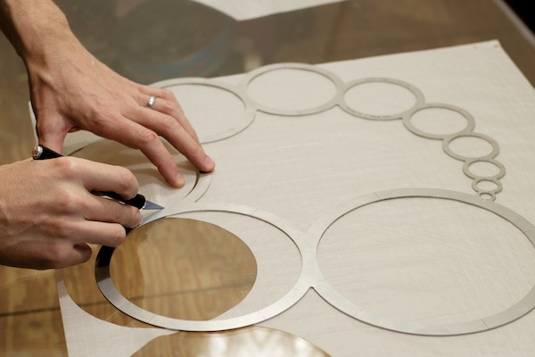 WindFire Designs Circle Tool cutting and sewing ripstop circles to make the clew on fabric