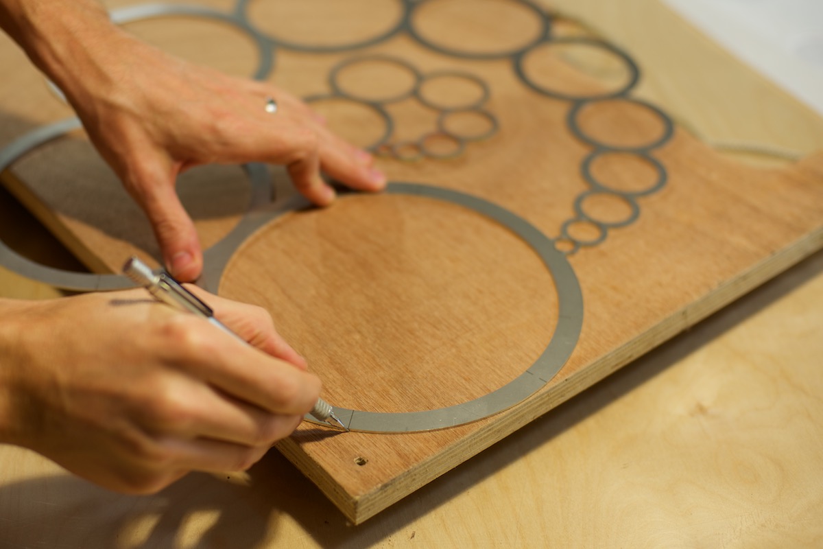 WindFire Designs Circle Tool shown as a quick way to mark a radius the corner of plywood