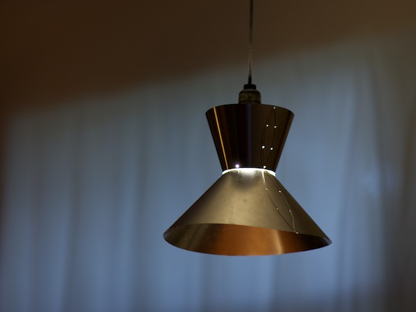 3-axis hover light by Tim Elverston with stainless steel shade hand sewn