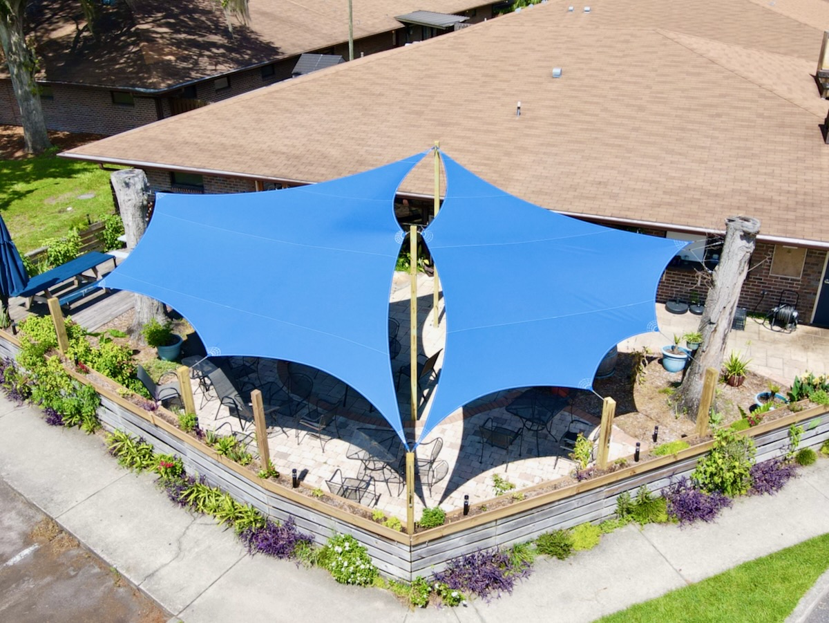 Restaurant shade sails WindFire Designs WeatherMax fabric