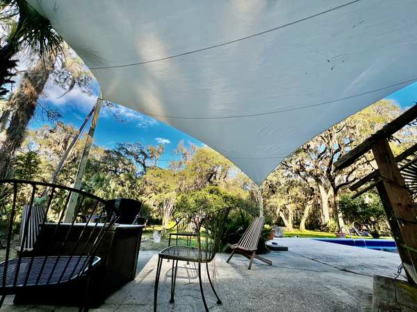 Image 62 from custom rainshades - tensile mambrane rain shelters for residential applications by windfire designs