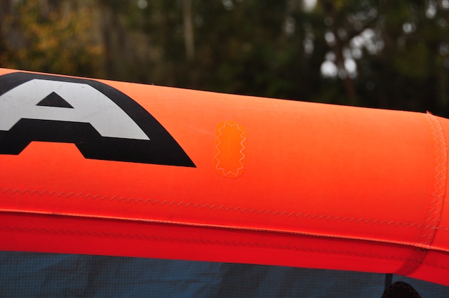 Repair graphics used as a deliberate design feature on the Cabrinha Revolver canopy