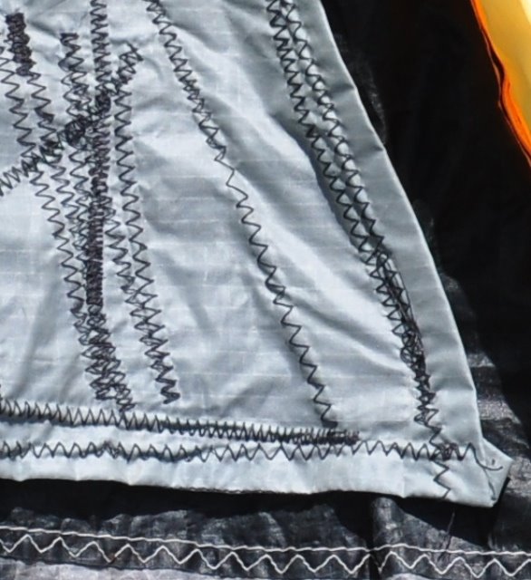 Stitching partially removed from the kite panel