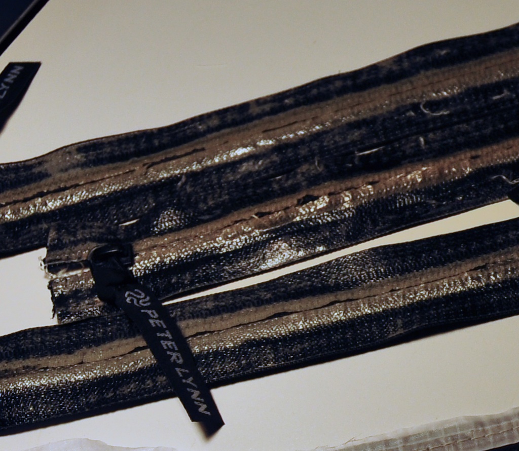 Delaminated sealed zipper removed from a Peter Lynn arc kite during repair