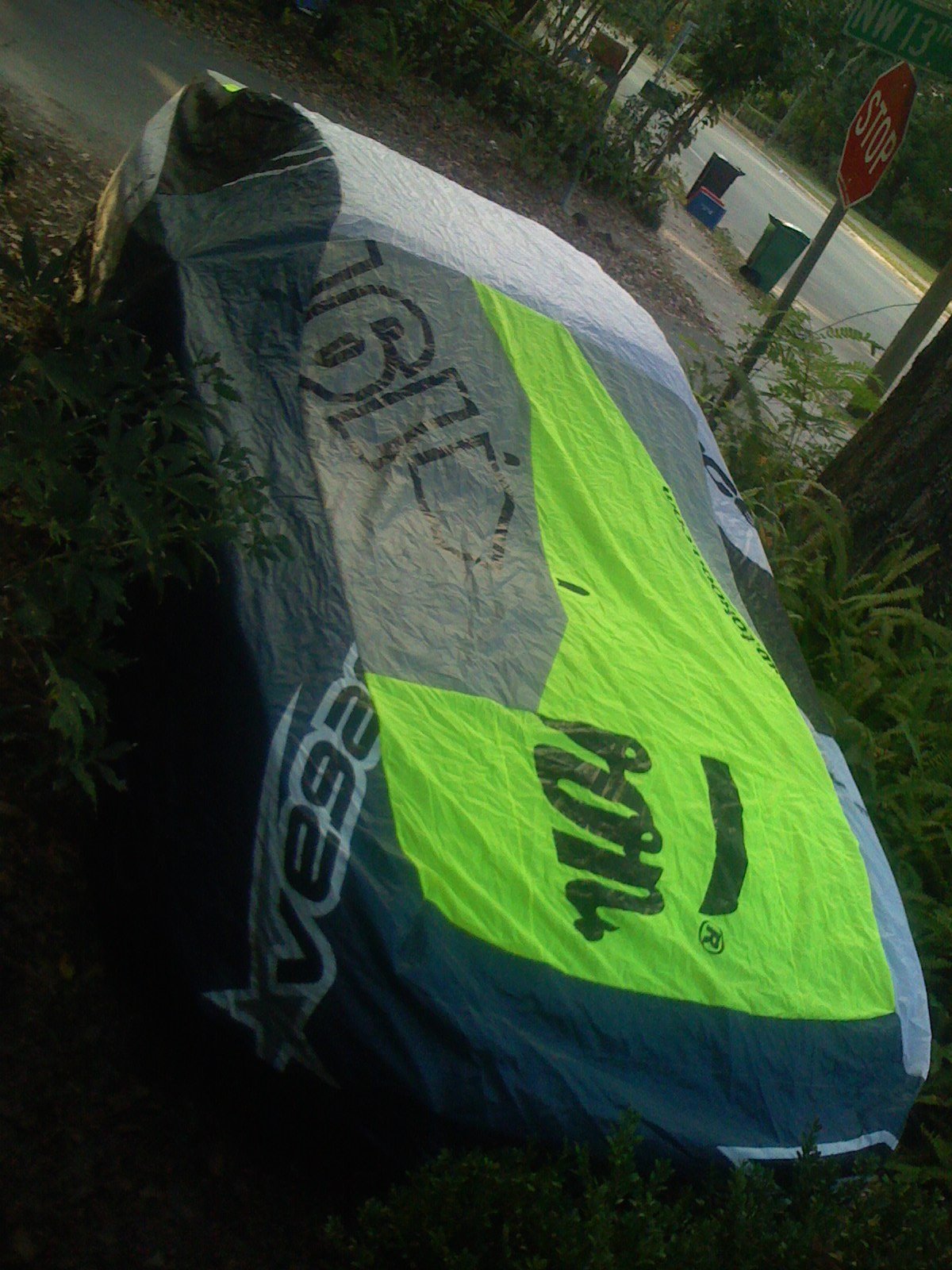 Custom car cover sewn from repurposed kite sail fabric