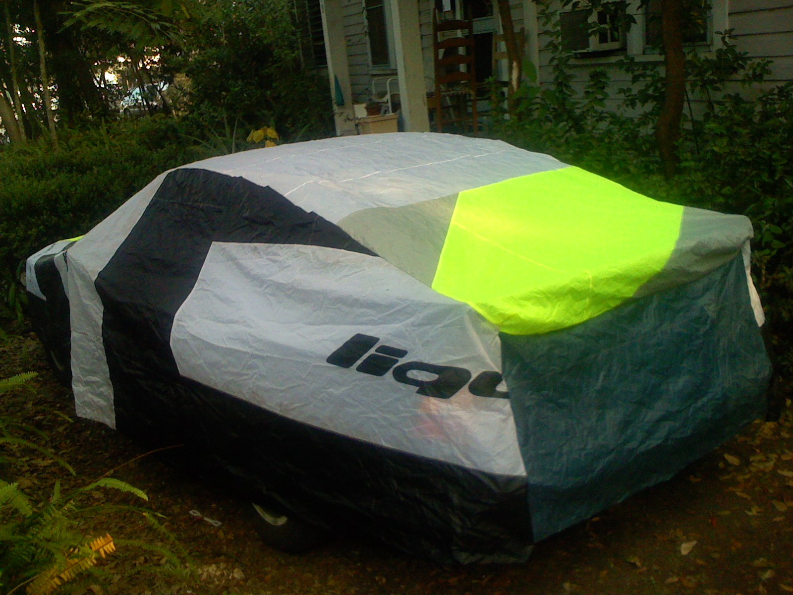 Panels of the car cover cut from scrap kite sail material