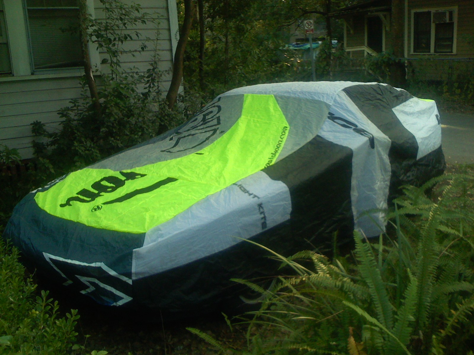 Draw string and cleat detail at the bottom edge of the kite-fabric car cover