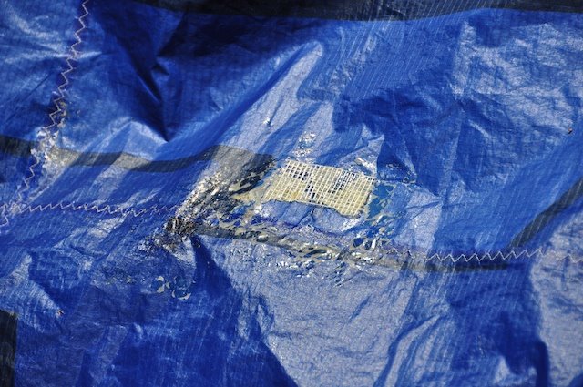 Kitefix repair system applied to a torn kite panel