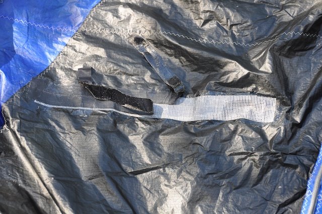 Fibrous gauze layer of the Kitefix system visible on the underside of the repair