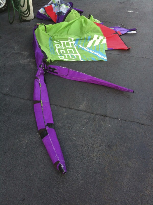 Torn wing tip pieces of a North Rebel kite saved intact for reassembly