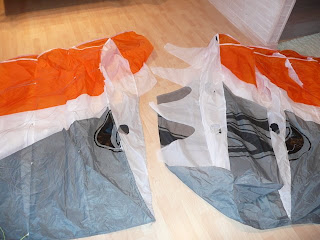 Ozone Access foil kite ripped in half, laid out before repair